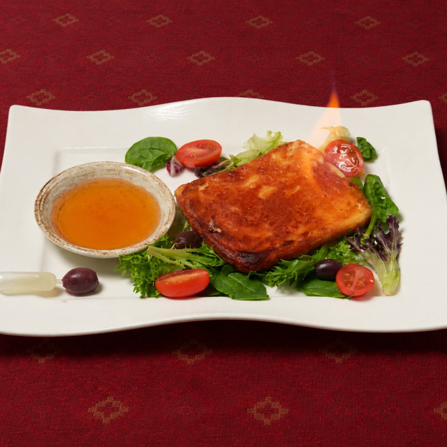 Flamed Saganaki Cheese.
